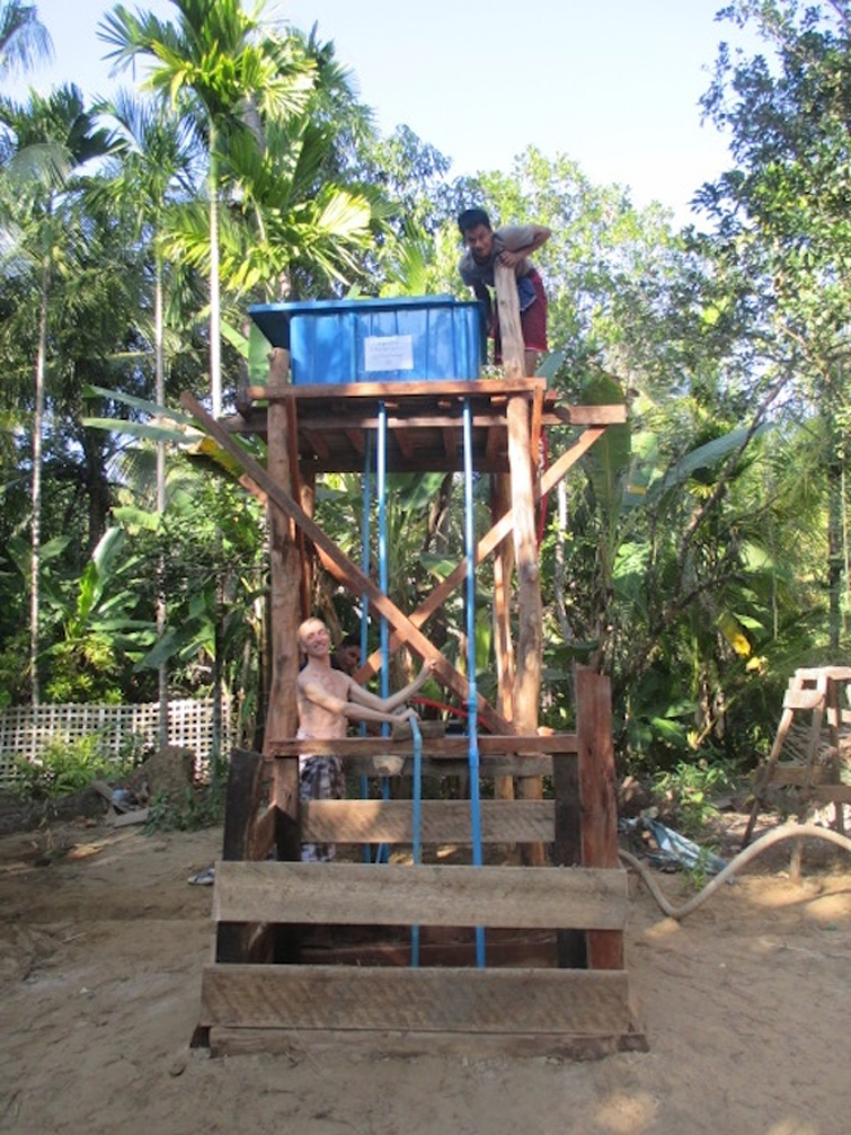 Our water tower after cleaning out the well and installation of a solar powered pump.