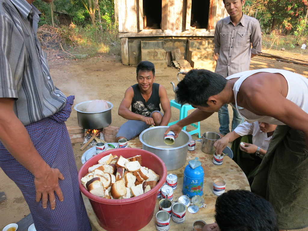 In Myanmar, every special occasion starts with cooking! Here are the Zikhone volunteer cooking group ladies in action for us, whilst the men steam rice and make tea.